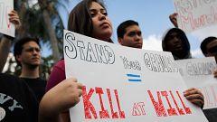 Image: Supporters of Trayvon Martin gather for a rally in front of Florida 