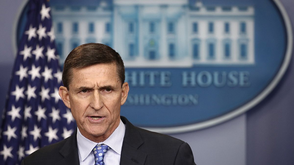 Image: National Security Adviser Michael Flynn answers questions in the bri