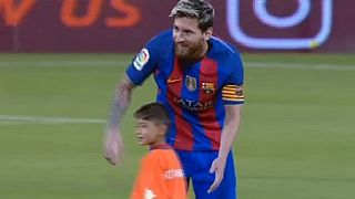 Lionel Messi meets 'plastic shirt' boy Murtaza Ahmadi