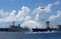 South China Sea: Beijing defiant over weapons deployment claims