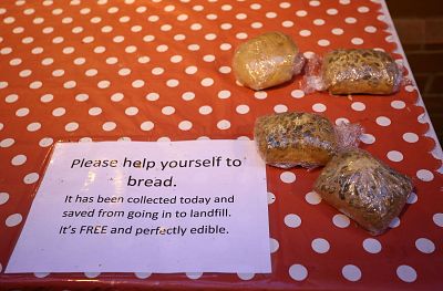 Community social enterprise ifOldham leaves free bread for passersby outside their offices.