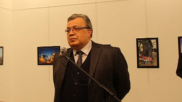 Photographer tells of dramatic moment he captured ambassador's murder in Turkey Photographer tells of dramatic moment he captured ambassador's murder in Turkey