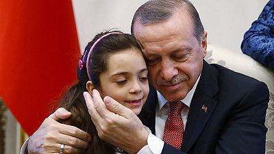 [Photos] 7-year-old Syrian twitter star meets Erdogan after Aleppo rescue