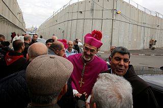 Christmas Eve crowds flock to Bethlehem