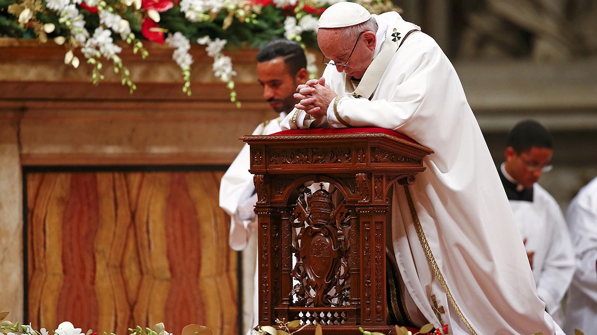 Pope Francis says Christmas "taken hostage" by materialism at Christmas Mass