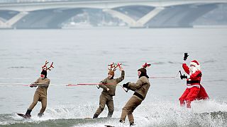 Water-skiing Santa and flying elves celebrate Christmas down the Potomac