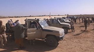 Former Tuareg rebels join gov't troops in a joint patrol in Northern Mali