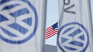 VW exec arrested in US, British drivers sue over emissions scandal