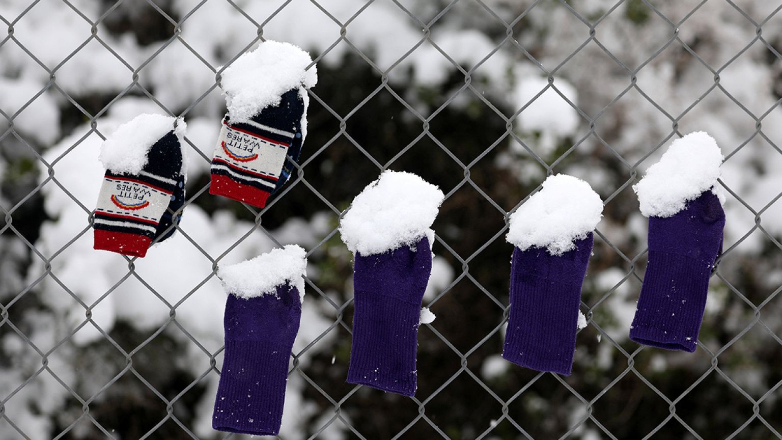 Refugees freezing in snow-hit Greece 'because of lack of EU solidarity'
