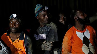 Thousands of South African miners stage sit-in strike 2.4km below ground