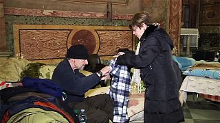 Rome church becomes homeless shelter in freezing weather