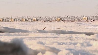 Refugiados atrapados en la nieve