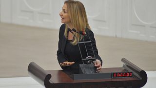 Mayhem in Turkish parliament after MP handcuffs herself to rostrum