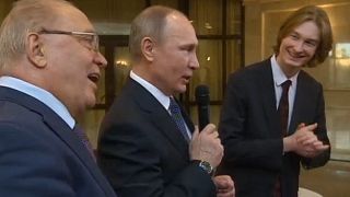 Putin sings Soviet song about space with Russian students