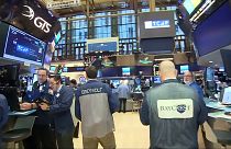Dow over 20,000, global shares rally
