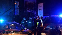 Image: Police secure the scene of a fire in an "escape room" that killed fi