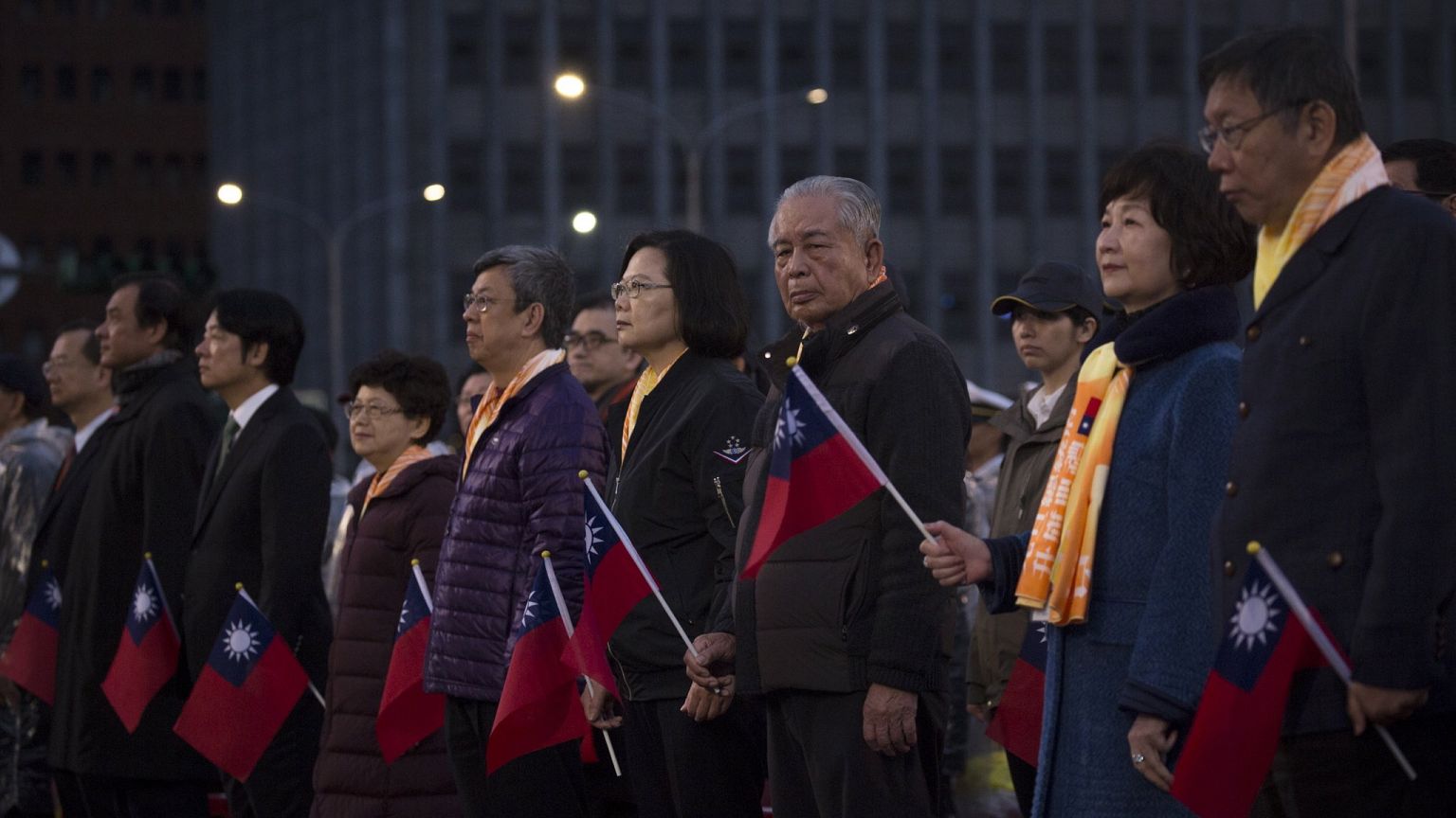 Taiwan president urges China to use peaceful means to solve differences in 