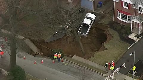 Shock as sinkhole swallows truck