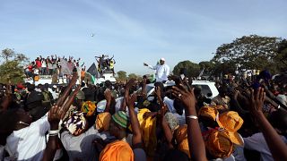 The Gambia's President Barrow arrives home to take office