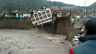 Watch: Hotel crashes into river as heavy rains hit Peru