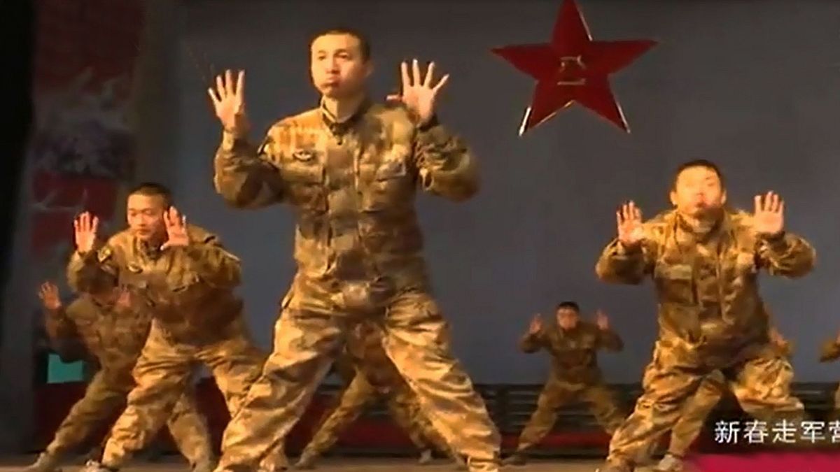 Chinese soldiers perform 'rooster dance' to ring in the New Year