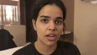 Image: Rahaf Mohammed Alqunan sits barricaded in a hotel room at Suvarnabhu