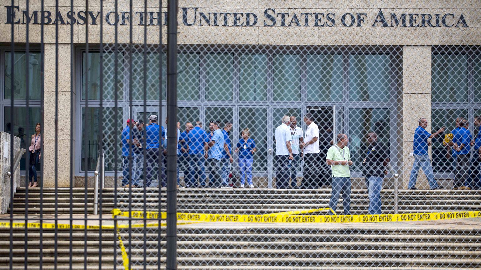 Staff stand within the United States embassy facility in Havana, Cuba on Se