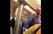 Watch: Woman films racist abuse from solicitor on train