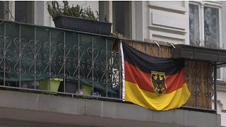 German launch raids against Third Reich supporters