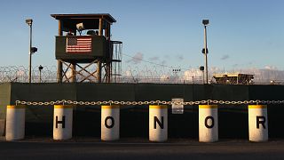 Image: A U.S. military guard tower at Guantanamo Bay detention center in Cu