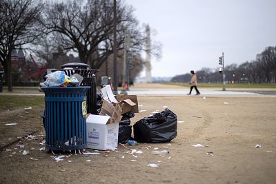 Uncollected trash sits on the National Mall in Washington on Dec. 31, 2018.