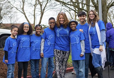 Jennifer and Sarah Hart pose with their six adopted children in 2016. All six of the children and their parents were believed to be in a vehicle that plunged off a coastal cliff.