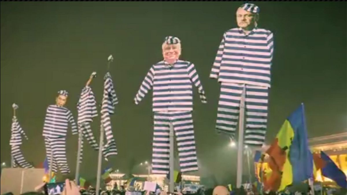 Watch: Romania's leaders 'appear' as convict cut-outs at Bucharest protest