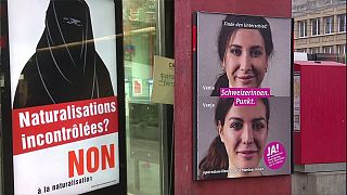 Swiss vote on citizenship rights and tax breaks