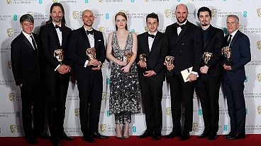 BAFTA stars show off their trophies