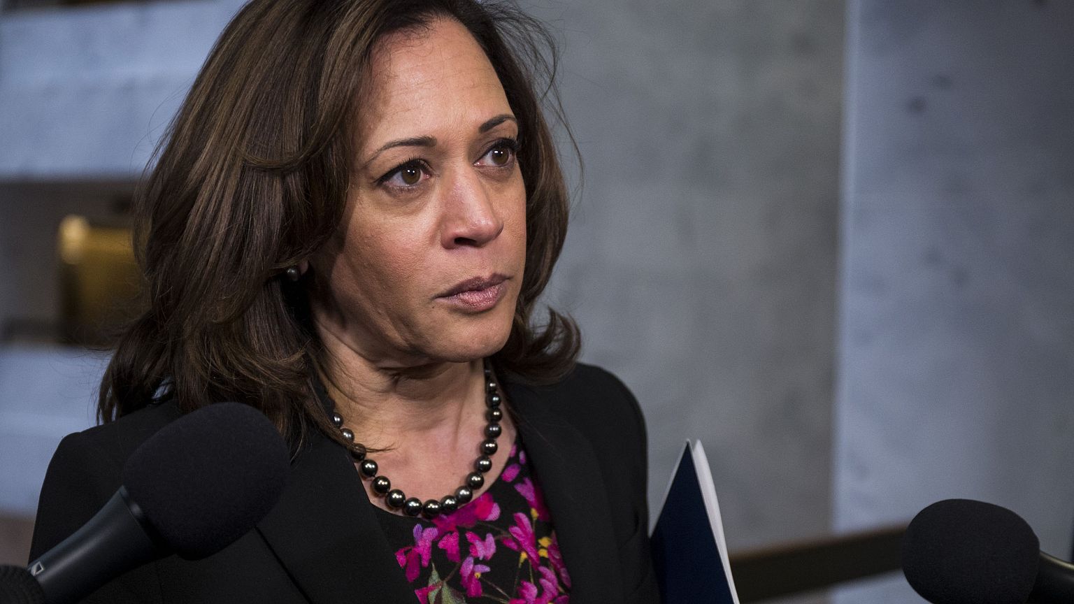 Image: Sen. Kamala Harris (D-CA) speaks to reporters following a closed bri