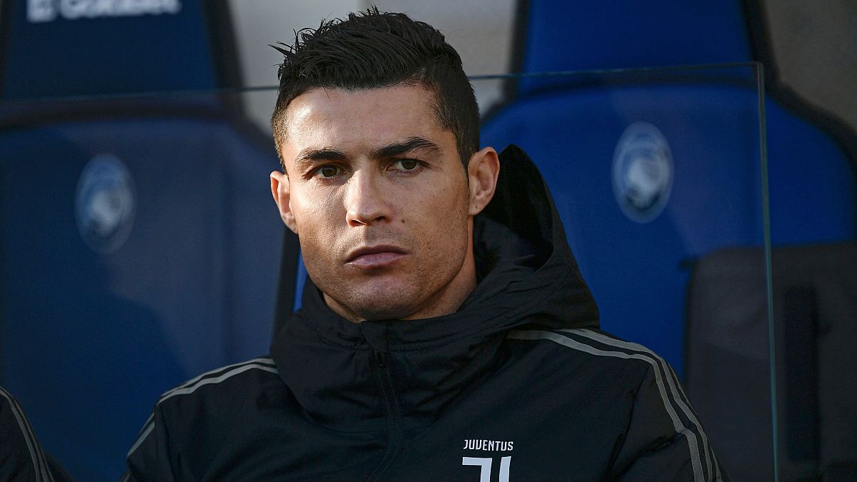 Cristiano Ronaldo looks on from the bench prior to a match on Dec. 26, 2018