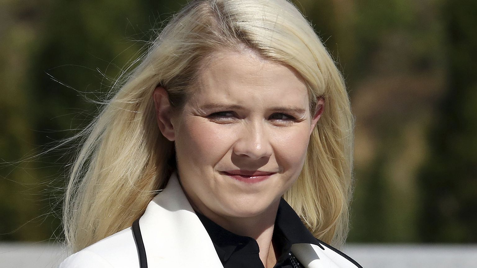 Image: Elizabeth Smart arrives for a news conference Thursday, Sept. 13, 20