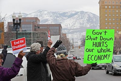 U.S. Internal Revenue Services employees rally in front of the Federal Building against the ongoing U.S. federal government shutdown, in Ogden, Utah on Jan. 10, 2019.