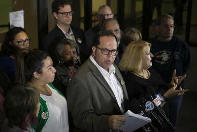 United Teachers Los Angeles union president Alex Caputo-Pearl, from center, speaks during a news conference at the Los Angeles Unified School District headquarters, in Los Angeles on Jan. 9, 2019.