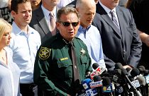 Image: Sheriff Israel addresses the news media outside Marjory Stoneman Dou