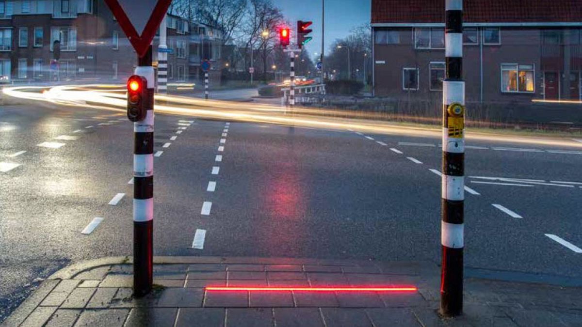 Floor lighting at pedestrian road crossing could prevent phone 'zombies' wandering into traffic