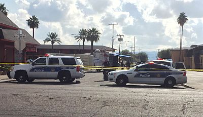 Police cars outside a Phoenix motel on Jan. 13, 2019.