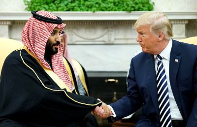 President Donald Trump shakes hands with Saudi Arabia\'s Crown Prince Mohammed bin Salman in the Oval Office of the White House on March 20, 2018.