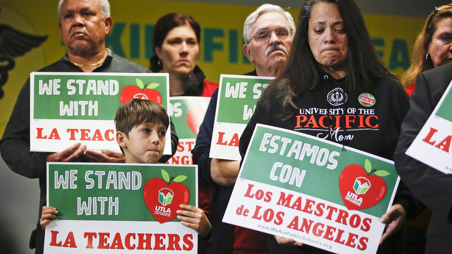 Student Leo Rittner Solomon, 6, and parent Hilda Rodriguez Guzman, right, r