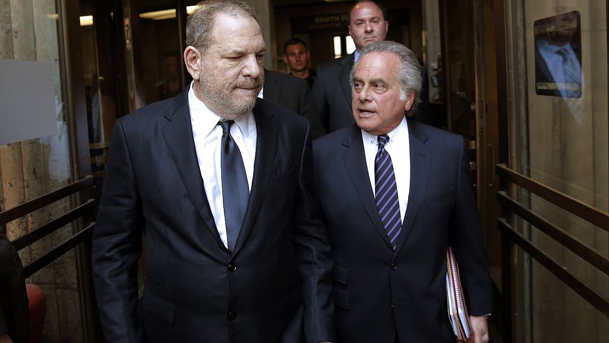 Image: Harvey Weinstein and his attorney, Benjamin Brafman, leave court in 