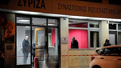 Masked attackers throw petrol bombs at Greece's Syriza party HQ