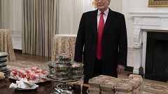 Image: United States President Donald J. Trump presents fast food to be ser