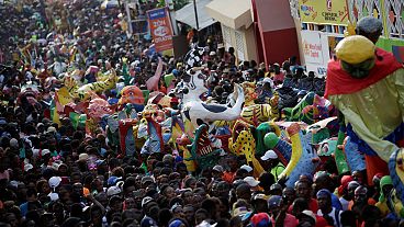Haitians begin Carnival celebration after confronting a hurricane, earthquake and political crisis.
