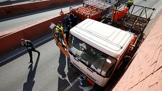 Spanish police stop truck laiden with gas canisters at gunpoint